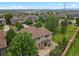 Charming two-story home with a well-manicured lawn and beautiful landscaping, surrounded by mature trees in a Gathering-friendly neighborhood at 24269 E Arapahoe Pl, Aurora, CO 80016