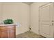 Laundry room featuring cabinets, washer hookups, and neutral paint at 24269 E Arapahoe Pl, Aurora, CO 80016