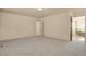 Spacious main bedroom with carpet flooring and adjoining bathroom at 24269 E Arapahoe Pl, Aurora, CO 80016