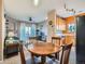 Open concept kitchen and living space with a breakfast nook and ceiling fan at 3230 Boulder Cir # 101, Broomfield, CO 80023
