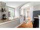 Bright kitchen with granite countertops, stainless steel appliances, and a charming window overlooking the backyard at 5326 Lowell Blvd, Denver, CO 80221