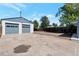 Two-car detached garage with concrete driveway at 3401 W Virginia Ave, Denver, CO 80219