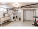 Finished basement featuring a laundry and workout area at 1844 S Lincoln St, Denver, CO 80210