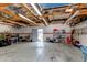 Large garage with ample lighting, storage, and workspace potential at 1844 S Lincoln St, Denver, CO 80210
