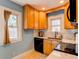 Bright kitchen with modern appliances, marble countertops and ample cabinet space at 1844 S Lincoln St, Denver, CO 80210