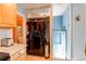 Open kitchen with a breakfast bar and stainless-steel appliances at 1844 S Lincoln St, Denver, CO 80210
