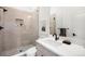 Modern bathroom featuring neutral decor, vanity and shower stall at 556 Monroe St, Denver, CO 80206