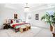 Bright bedroom featuring a modern bed frame, neutral tones, an area rug and natural light at 556 Monroe St, Denver, CO 80206