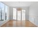 Bright dining room with a large window and elegant molding at 556 Monroe St, Denver, CO 80206