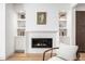 Modern fireplace design with white brick surround and built-in shelving at 556 Monroe St, Denver, CO 80206