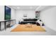 Modern living room with large sectional sofa, area rug, console table, and bright natural light at 556 Monroe St, Denver, CO 80206