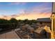 Rooftop patio with comfortable seating and stunning sunset views, perfect for outdoor entertaining at 556 Monroe St, Denver, CO 80206