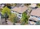 Aerial view of home in neighborhood with lush landscaping and fenced backyard at 11935 E Lake Ct, Greenwood Village, CO 80111