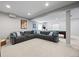 Large finished basement with ample seating, a billiards table, and a entertainment area offering versatile use at 11935 E Lake Ct, Greenwood Village, CO 80111