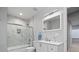 Modern bathroom with stylish vanity, tiled shower, and updated fixtures; creating a spa-like experience at 11935 E Lake Ct, Greenwood Village, CO 80111