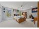 Bright bedroom with ample natural light, a ceiling fan and decorative pennants at 11935 E Lake Ct, Greenwood Village, CO 80111