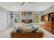Bedroom with ample natural light, a ceiling fan and closet at 11935 E Lake Ct, Greenwood Village, CO 80111