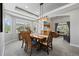 Dining area with modern lighting and multiple windows at 11935 E Lake Ct, Greenwood Village, CO 80111