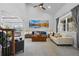 Bright living room featuring high ceilings and an open-concept layout at 11935 E Lake Ct, Greenwood Village, CO 80111