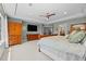 Well-lit main bedroom with a tray ceiling, ensuite bathroom and generous closet space at 11935 E Lake Ct, Greenwood Village, CO 80111