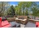 Inviting stone patio featuring a built-in fireplace and comfortable seating area perfect for outdoor entertaining at 11935 E Lake Ct, Greenwood Village, CO 80111