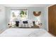 Light-filled bedroom with large window and decorative touches at 3242 4Th St, Boulder, CO 80304