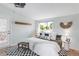 Bedroom with a window view, black and white rug, and modern decor at 3242 4Th St, Boulder, CO 80304