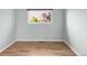 Bright bedroom with hardwood floors and a window providing natural light at 3242 4Th St, Boulder, CO 80304
