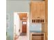 Inviting entryway with natural wood cabinets and marble countertop at 3242 4Th St, Boulder, CO 80304