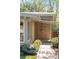The front entrance of the house showing the address, landscaping, and walkway at 3242 4Th St, Boulder, CO 80304