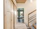 Bright hallway leads to a dining area with natural wood trim and flooring at 3242 4Th St, Boulder, CO 80304