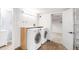 Laundry room with modern washer, dryer and sink at 3242 4Th St, Boulder, CO 80304