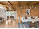 Open-concept living room with hardwood floors, stylish furnishings, and access to the dining area at 3242 4Th St, Boulder, CO 80304