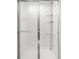 Modern shower with glass doors and storage shelves at 3242 4Th St, Boulder, CO 80304