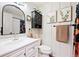 Cozy bathroom with classic vanity, framed mirror, and decorative accents at 7 Shetland Ct, Highlands Ranch, CO 80130