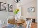Charming dining area featuring a wood table and seating at 7 Shetland Ct, Highlands Ranch, CO 80130