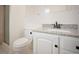 Updated bathroom featuring a walk in shower and granite countertops at 7659 S Holland Way, Littleton, CO 80128