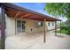 Back of home shows covered patio, and siding at 7659 S Holland Way, Littleton, CO 80128