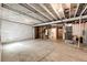Large unfinished basement with concrete floor, exposed utilities, and potential for customization at 985 S Elk Way, Aurora, CO 80018