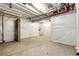 Spacious unfinished basement featuring concrete floors and white-wrapped walls at 985 S Elk Way, Aurora, CO 80018