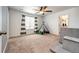 Spacious bedroom with a tent, window with striped curtains, and a cozy atmosphere for  at 985 S Elk Way, Aurora, CO 80018