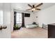 Cozy bedroom with a ceiling fan, playful decor, and a comfortable space for relaxation at 985 S Elk Way, Aurora, CO 80018