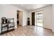 Bright dining area with sliding glass doors to the backyard and a modern coffee bar at 985 S Elk Way, Aurora, CO 80018