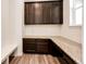 Home office with built-in desk and shelving at 985 S Elk Way, Aurora, CO 80018