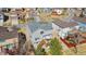 Aerial view of house showcasing backyard, deck and surrounding neighborhood at 9230 W Indore Dr, Littleton, CO 80128