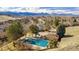 Community pool with trees and grass nearby at 9230 W Indore Dr, Littleton, CO 80128