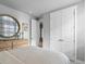 Stylish bedroom featuring modern decor, neutral tones, and ample natural light at 9035 S Shawnee Ct, Aurora, CO 80016