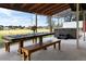 Outdoor space with dining table and hot tub, perfect for entertaining and relaxing in a serene country setting at 20155 E Davies Ave, Centennial, CO 80016