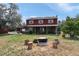 Spacious backyard featuring a fire pit and seating, ideal for outdoor gatherings and enjoying nature at 20155 E Davies Ave, Centennial, CO 80016