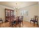 Traditional dining room featuring a beautiful chandelier and classic furnishings at 7197 S Newland St, Littleton, CO 80128